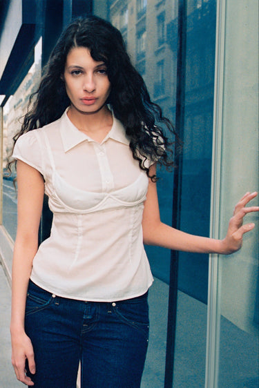 semi sheer, cap-sleeve button-up collared top featuring an external bra detail layered over