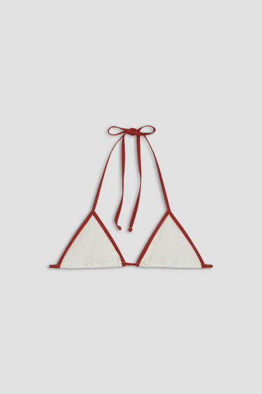 Red and white bikini top on a light gray background