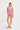nude-and-pink striped short-sleeve polo with white collar and matching booty short