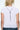 white shortsleeve tshirt with layered necklace print