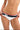 Woman wearing a white bikini with red accents on a white background