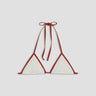 Red and white bikini top on a light gray background