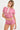 nude-and-pink striped short-sleeve polo with white collar and matching booty short
