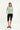 nude-and-turquoise striped long sleeve knit sweater with turquoise cuffs